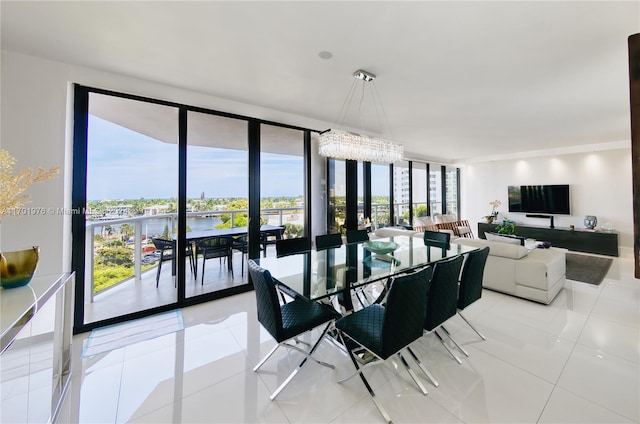 dining room featuring expansive windows, a wealth of natural light, and light tile patterned flooring