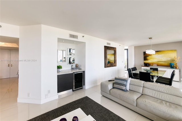 tiled living room with beverage cooler