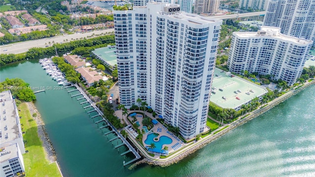 birds eye view of property with a water view