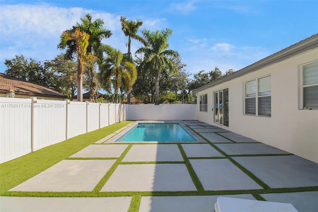 view of pool featuring a patio area