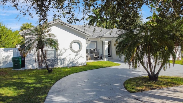 view of front of home with a front yard