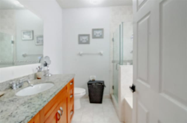 full bathroom with vanity, toilet, and independent shower and bath