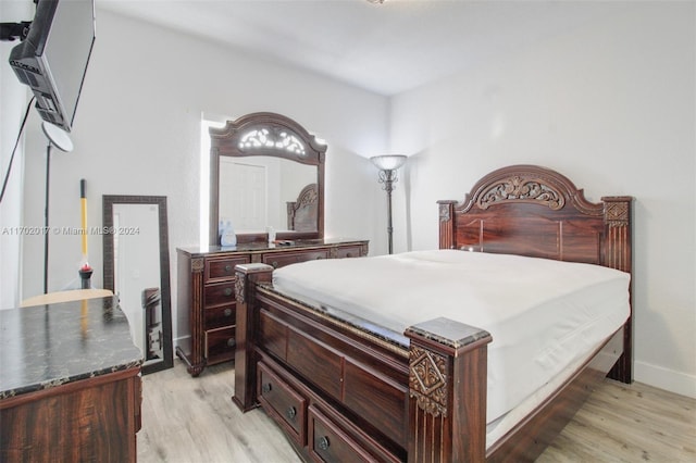 bedroom with light wood-type flooring