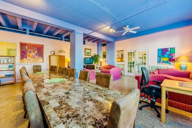 dining area with ceiling fan and french doors