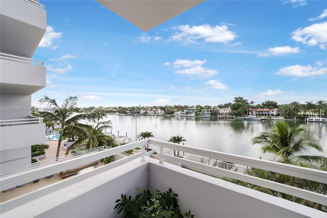 balcony featuring a water view