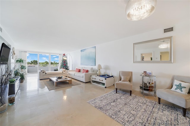 living room with floor to ceiling windows