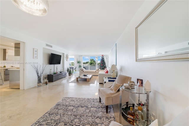 living room featuring concrete flooring