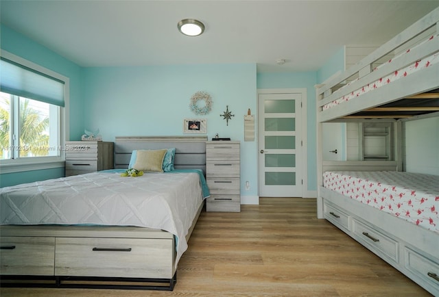 bedroom with light hardwood / wood-style flooring