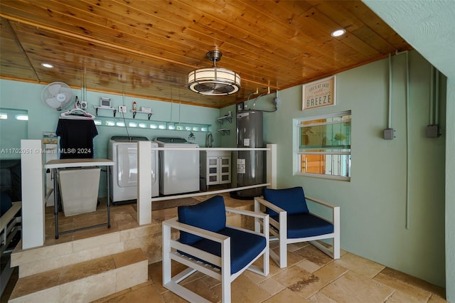 kitchen with washing machine and clothes dryer, water heater, and wooden ceiling