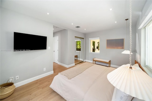 bedroom featuring light hardwood / wood-style flooring