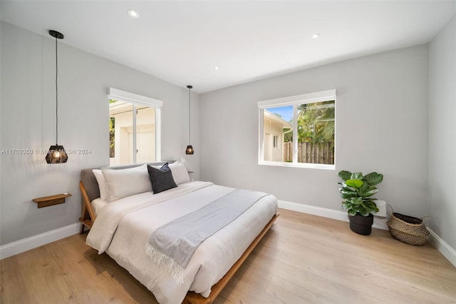 bedroom featuring light wood-type flooring