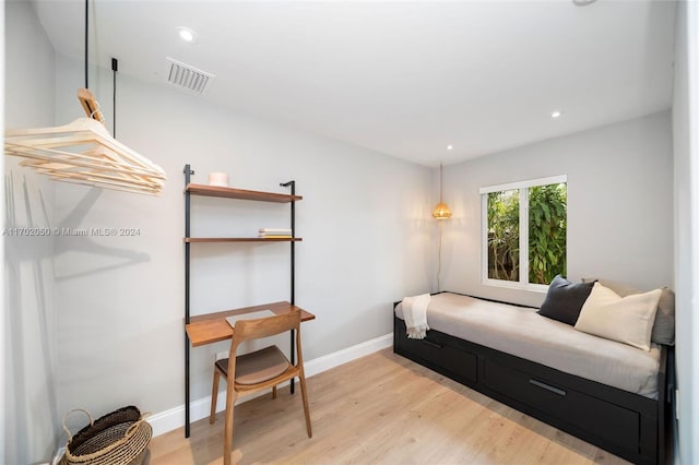 bedroom featuring light hardwood / wood-style flooring