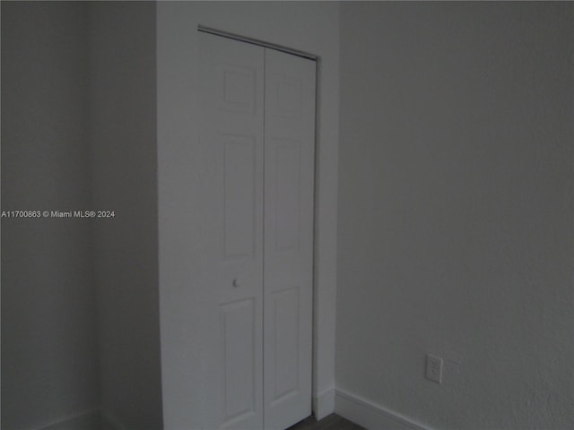 unfurnished bedroom with a closet