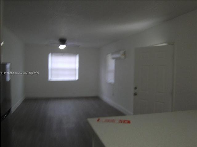 unfurnished room featuring dark hardwood / wood-style floors