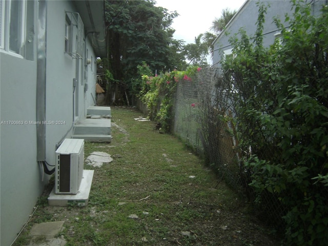 view of yard featuring ac unit