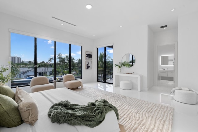 bedroom featuring access to outside and multiple windows