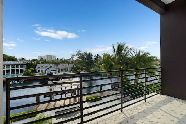 balcony featuring a water view