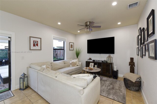 living room with ceiling fan