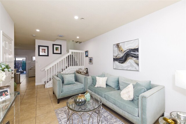 living room featuring light tile patterned floors