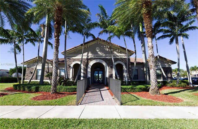 view of front facade featuring french doors