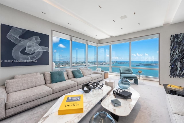 living room featuring a water view