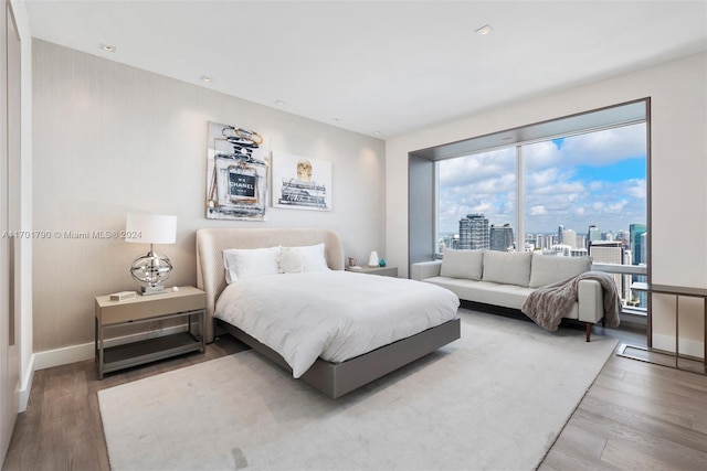 bedroom featuring wood-type flooring