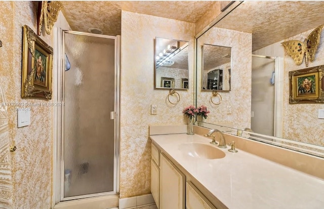 bathroom featuring vanity and walk in shower