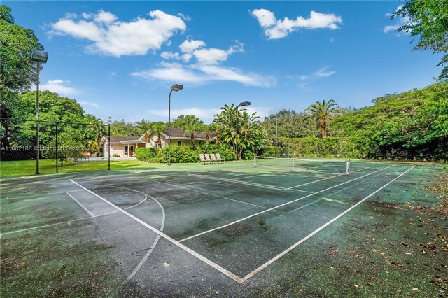 view of tennis court with basketball court