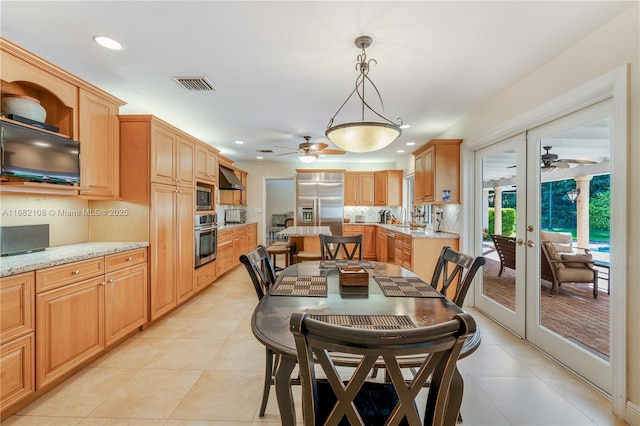 dining room featuring light tile patterned floors, visible vents, and recessed lighting