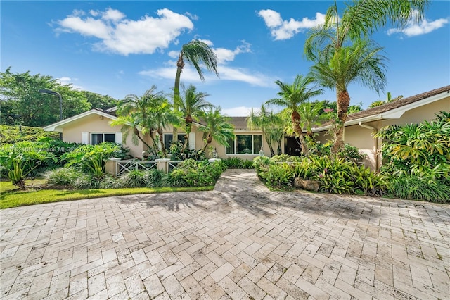 view of front of house featuring stucco siding