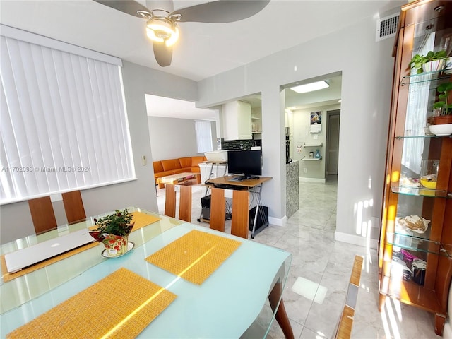 dining room with ceiling fan