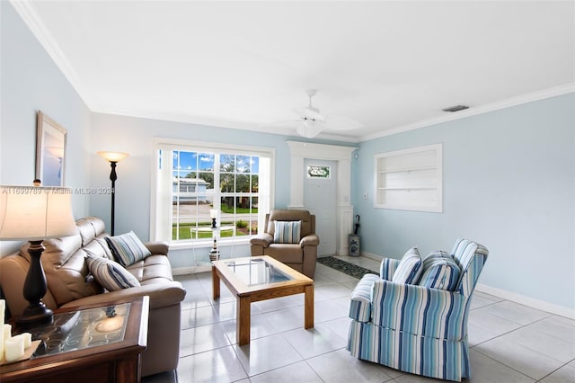 living room with ceiling fan, light tile patterned floors, and crown molding