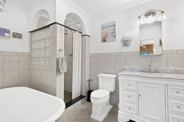 full bathroom featuring tile patterned floors, plus walk in shower, and tile walls