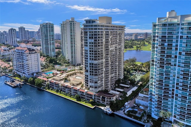 birds eye view of property featuring a water view