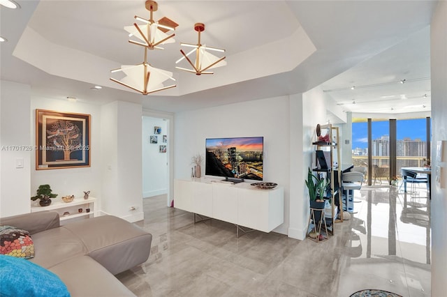 20191 E Country Club Dr Unit 2310, Aventura, FL 33180 - living area with baseboards, recessed lighting, a raised ceiling, expansive windows, and a notable chandelier