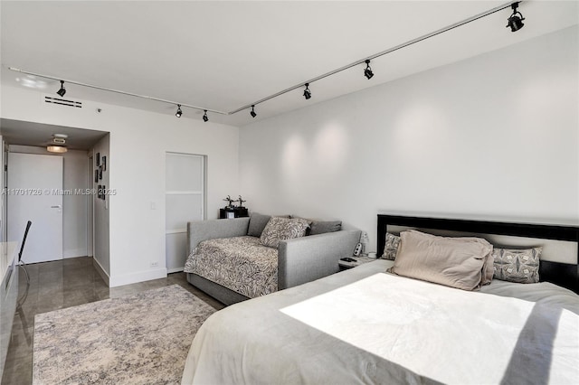 20191 E Country Club Dr Unit 2310, Aventura, FL 33180 - bedroom featuring baseboards, rail lighting, and visible vents