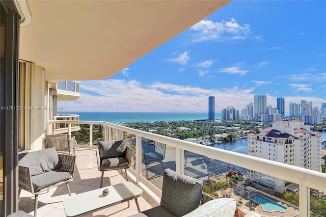 balcony featuring a water view