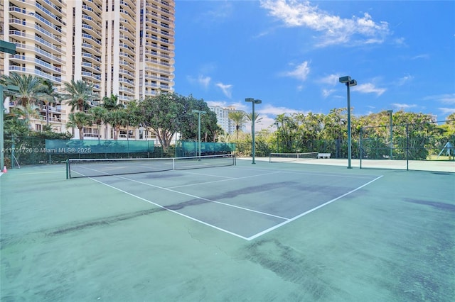 20191 E Country Club Dr Unit 2310, Aventura, FL 33180 - view of sport court featuring fence