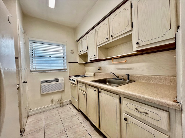 kitchen with light tile patterned floors, white range, a wall mounted AC, and sink