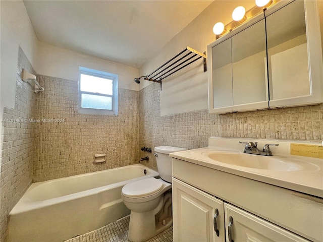 full bathroom featuring tasteful backsplash, vanity, tile patterned flooring, toilet, and tiled shower / bath