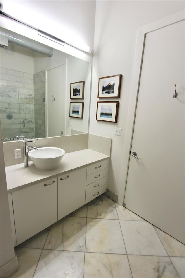 bathroom with vanity and walk in shower