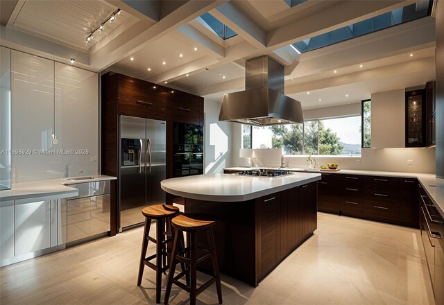 2010 NE 120th Rd, North Miami, FL 33181 - kitchen featuring modern cabinets, stainless steel appliances, island range hood, a kitchen bar, and beamed ceiling