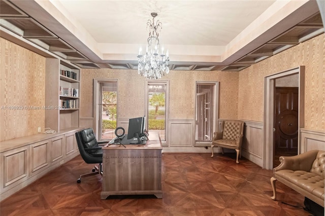 home office featuring an inviting chandelier, dark parquet flooring, and built in features