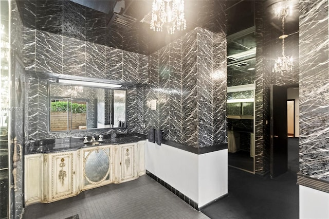 interior space with vanity and an inviting chandelier