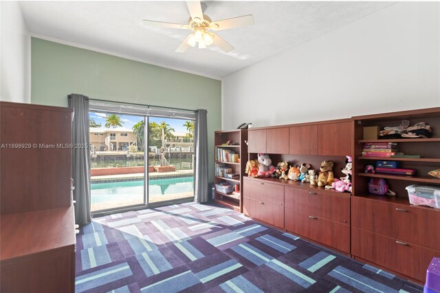 2010 NE 120th Rd, North Miami, FL 33181 - carpeted bedroom featuring access to exterior and ceiling fan