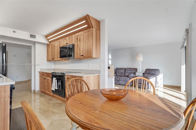 dining room with light tile patterned floors