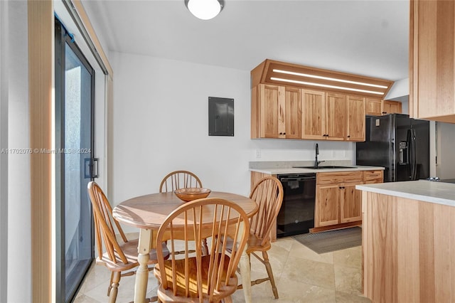 kitchen featuring black appliances, light tile patterned flooring, sink, and electric panel