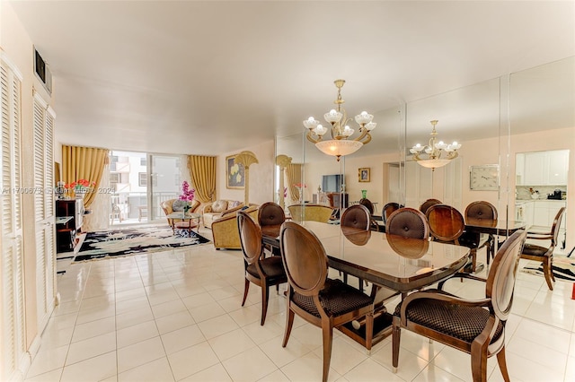 1849 S Ocean Dr Unit 1412, Hallandale Beach, FL 33009 - dining space featuring a chandelier and light tile patterned floors