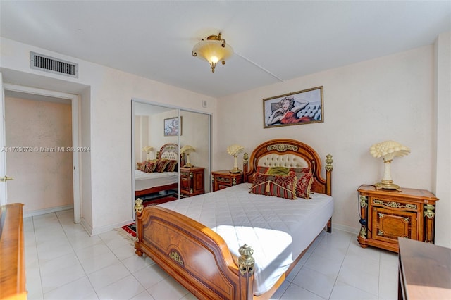1849 S Ocean Dr Unit 1412, Hallandale Beach, FL 33009 - bedroom featuring a closet, light tile patterned flooring, and baseboards