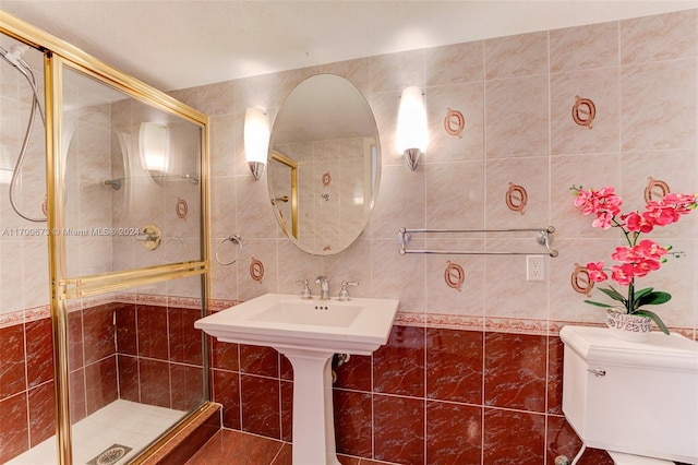 1849 S Ocean Dr Unit 1412, Hallandale Beach, FL 33009 - full bathroom featuring tile walls, toilet, and a stall shower